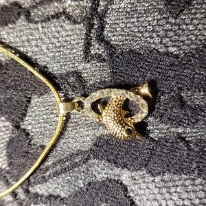 18" Gold plated w/rhinestones dolphin necklace & pendant.